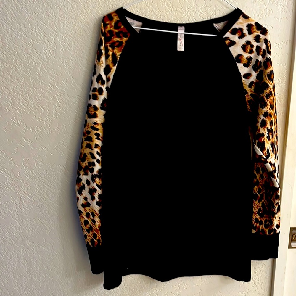 Women’s size medium leopard long sleeve top
